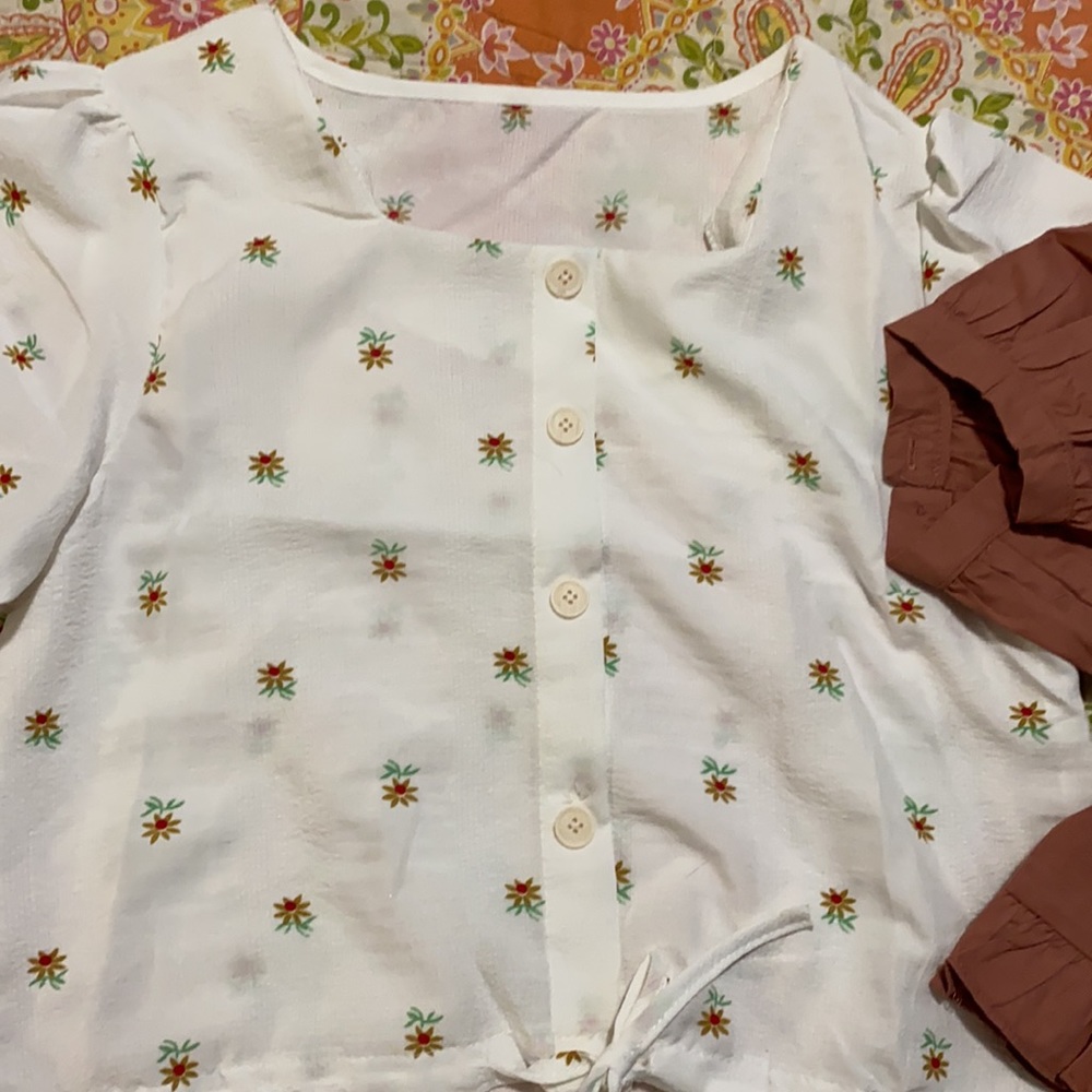 Two new cropped tops sold together